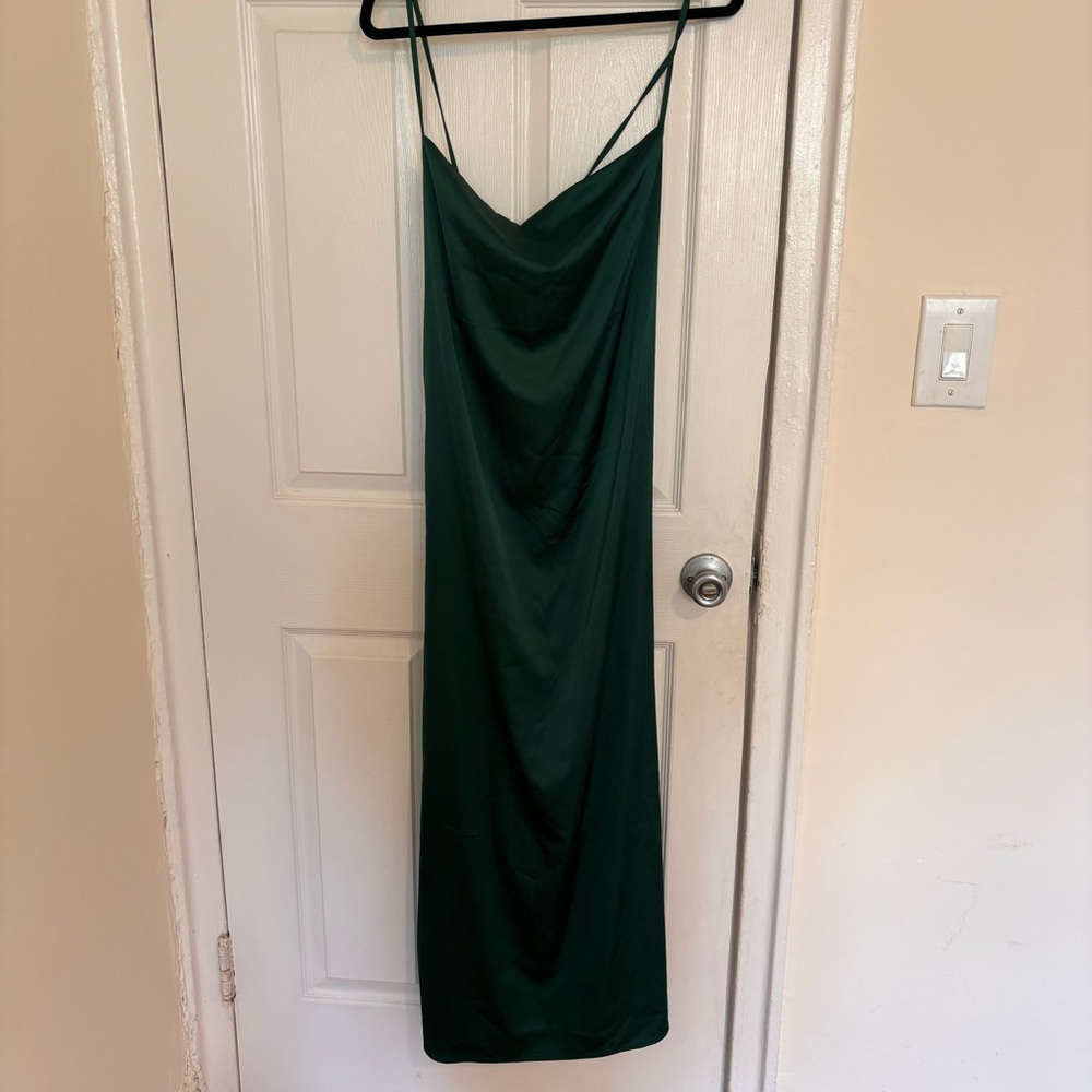 Green satin maxi dress with tie back detail and small slit